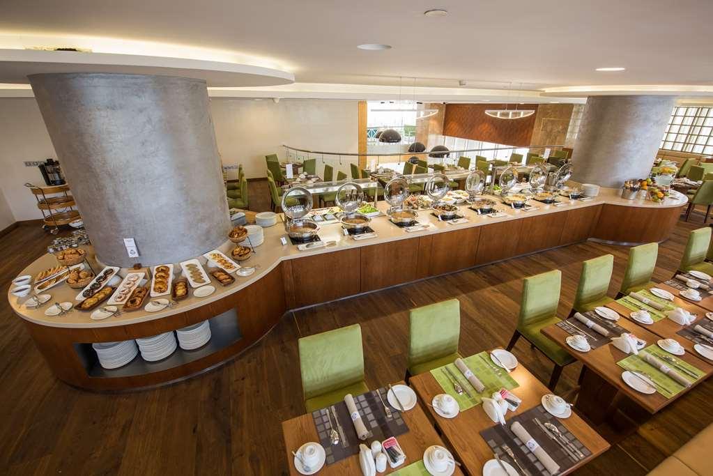 The Avenue Hotel Доха Удобства фото The restaurant